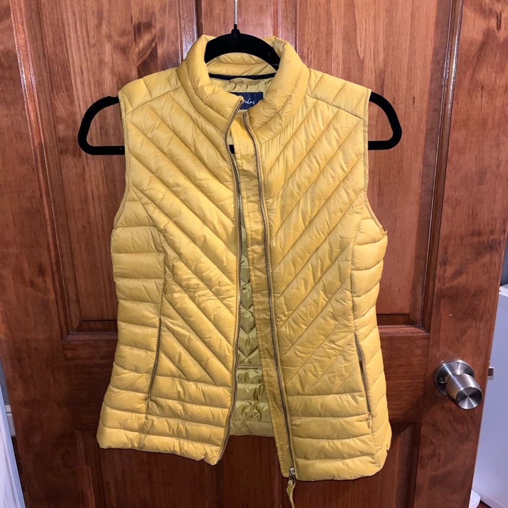 Lightly worn, yellow vest